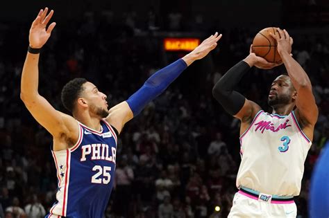 sixers lose to heat